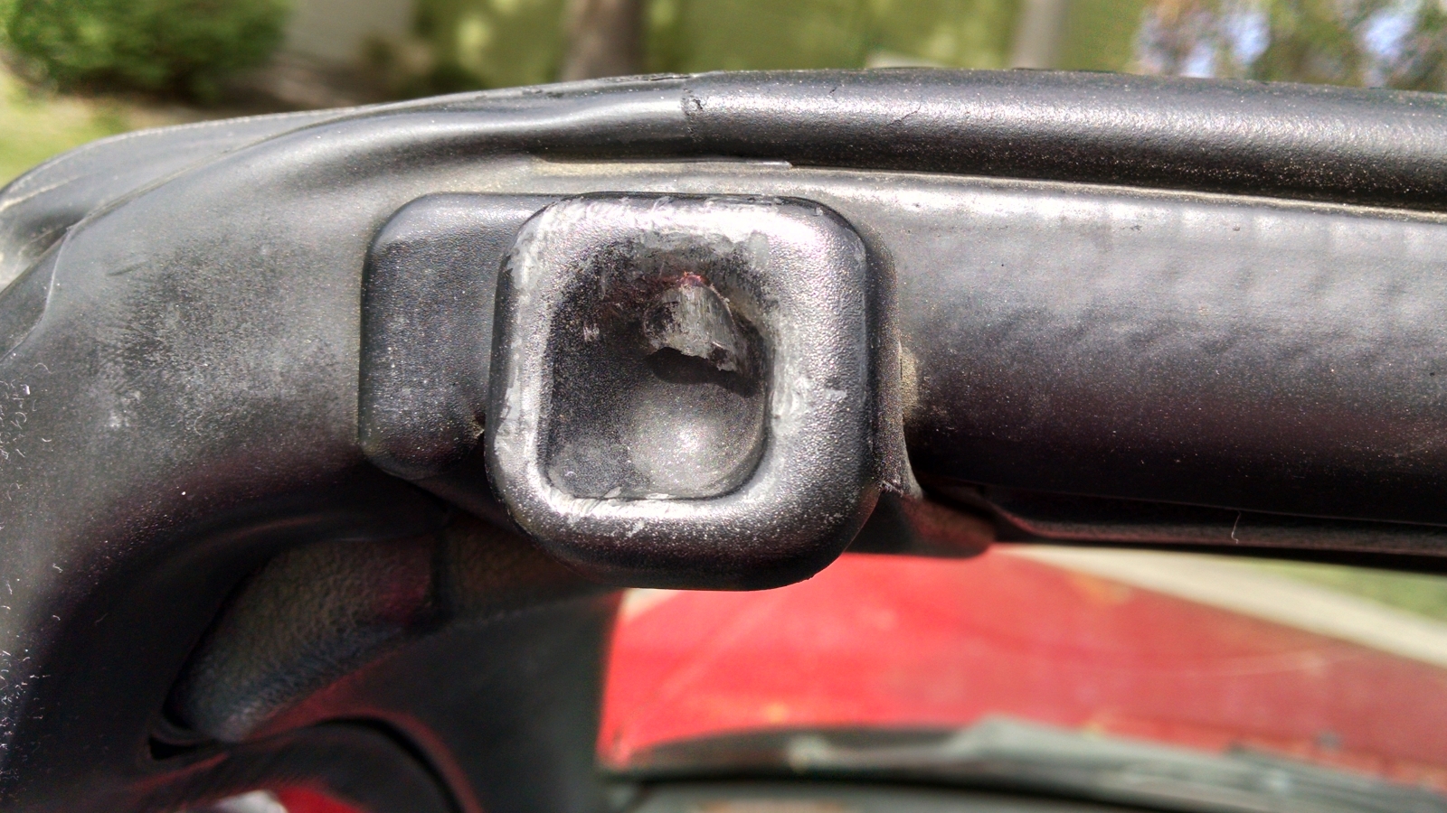 Original worn Miata latch striker