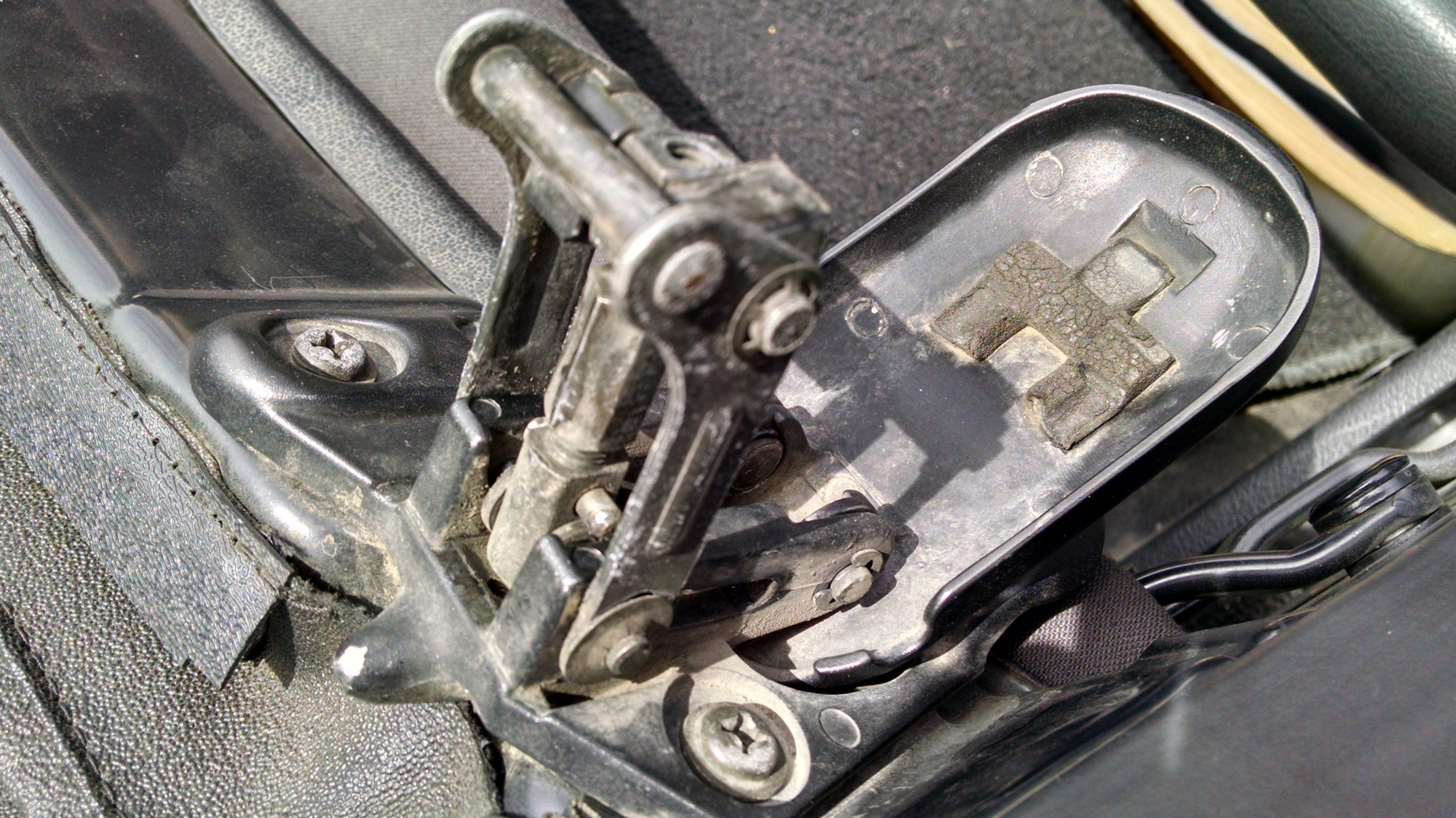 Worn Miata convertible top latch