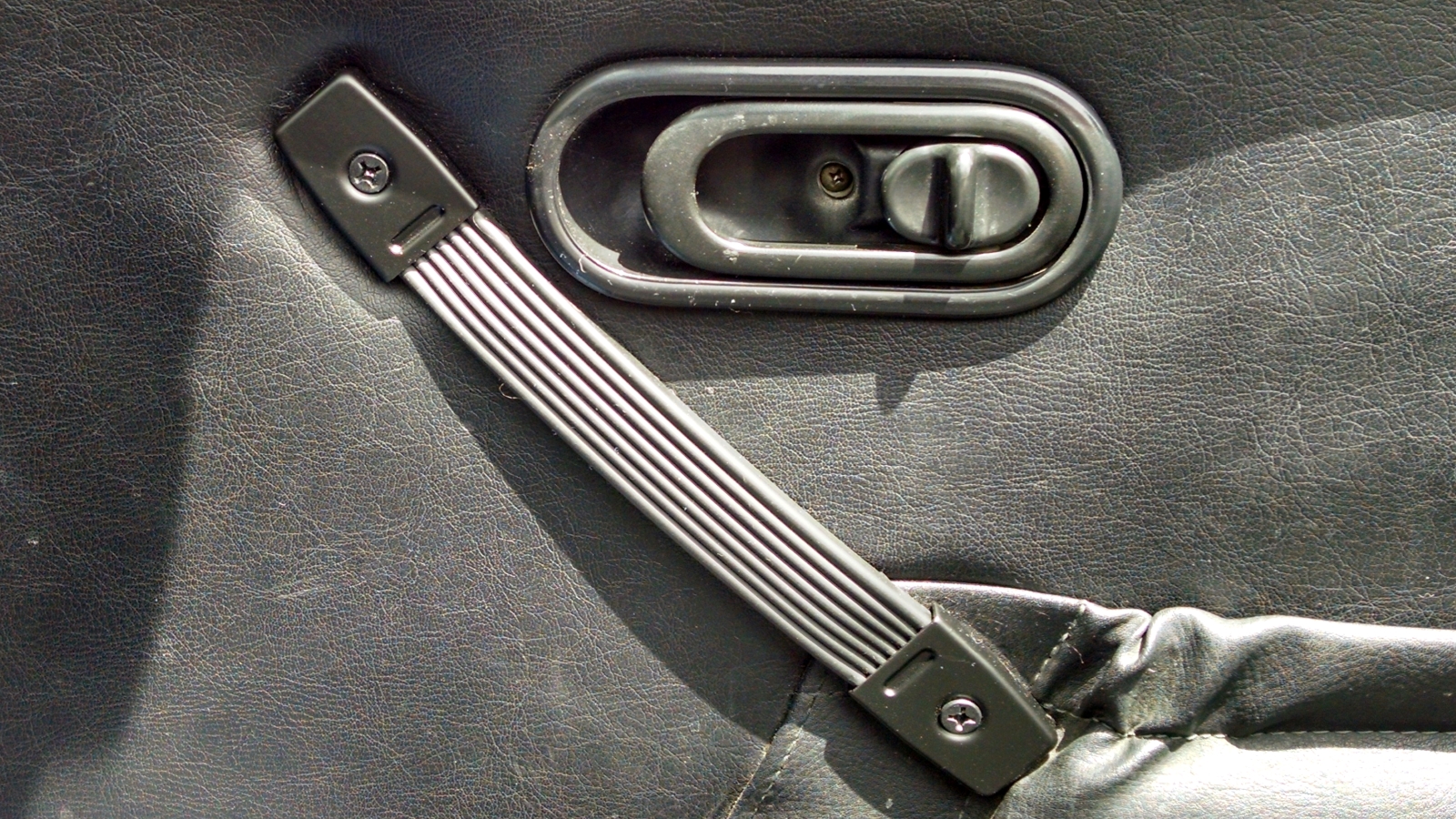 Miata door handle replaced with Parts-Express Penn-Elcom strap handle