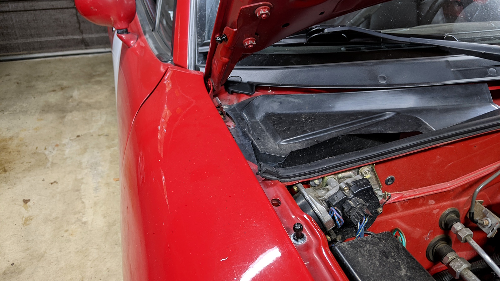 Lower ball stud installed in-place of fender bolt